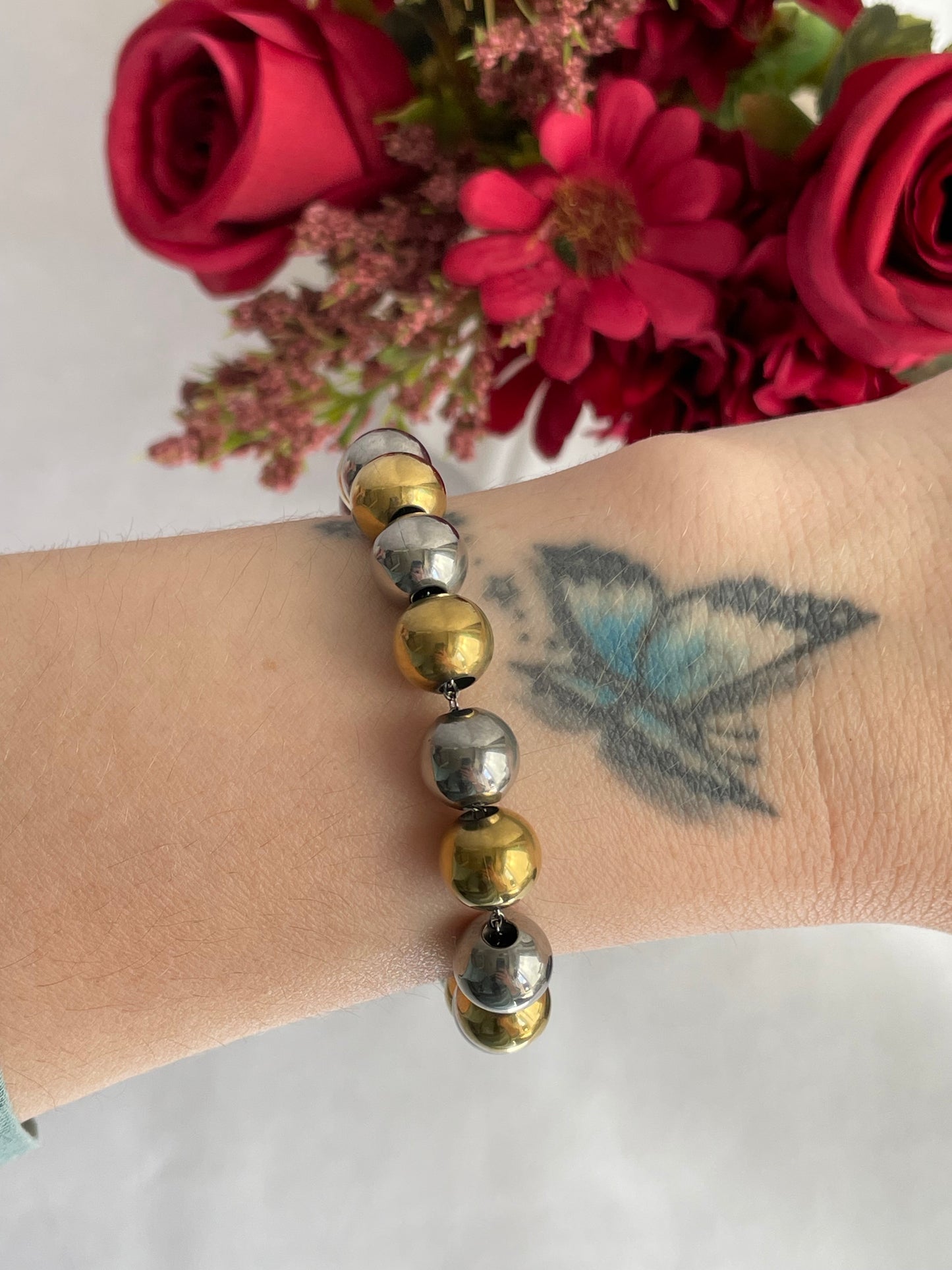 Bracciale sfere bicolor sonaglio